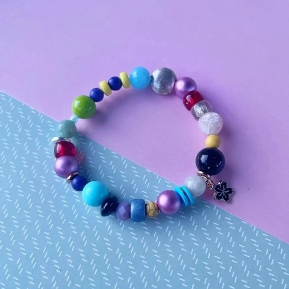 Handmade beaded statement bracelet‎ with flower charm